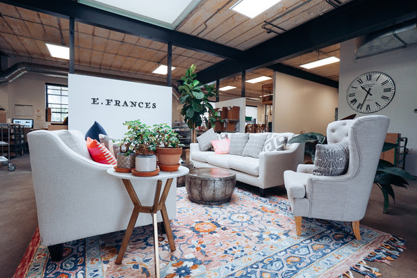 Here's how E. Frances Paper transformed a dealership's garage into an industrial-chic workspace